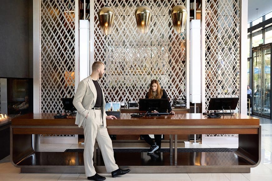 People at receptionist desk