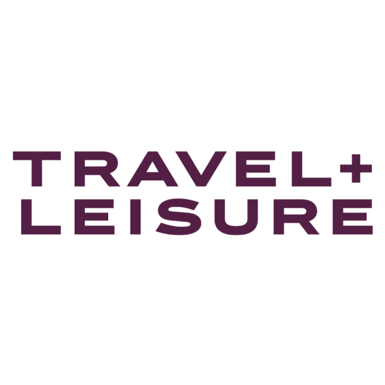 Travel + Leisure logo in purple on a black background.